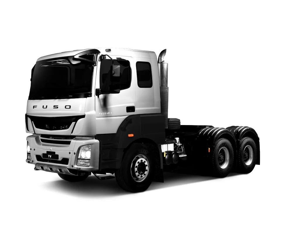 Silver FUSO TV extra-heavy truck tractor with a three-axle chassis